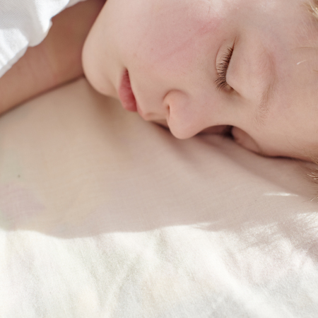 Teenager boy sleepingの写真素材