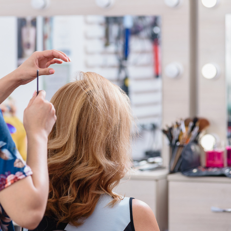 Hairdresser during workの写真素材