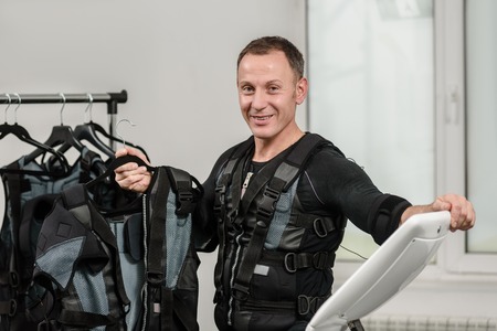 Sportsman with EMS vestsの写真素材