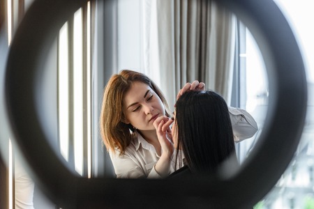 Visagist working in salonの写真素材