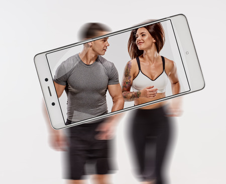 Sporty couple joggingの写真素材