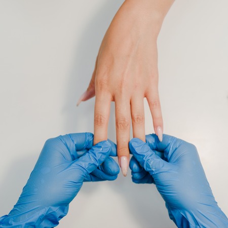 Female hands with manicureの写真素材