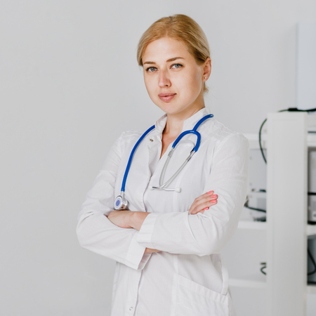 Doctor with ultrasound scannerの写真素材