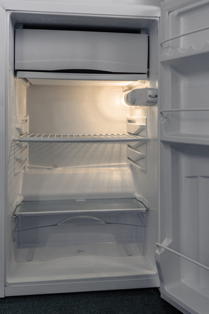 Opened empty fridgeの写真素材