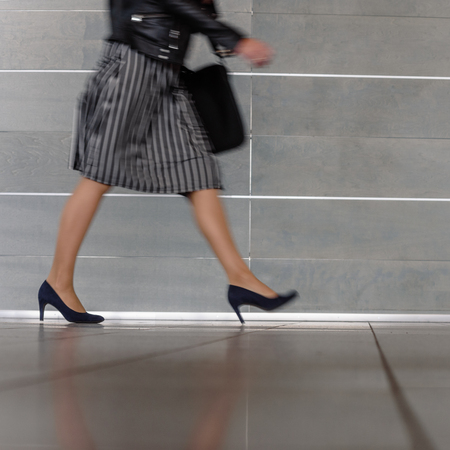 Busy woman walkingの写真素材