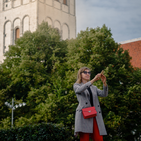 Female tourist photographingの写真素材