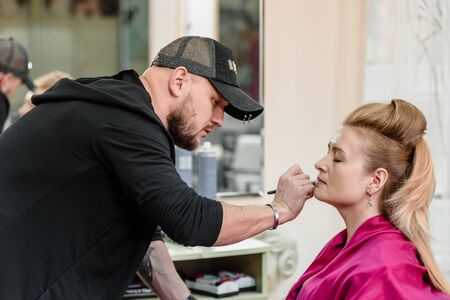 Male visagist workingのeditorial素材