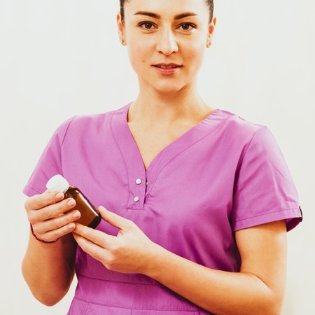 Beautician with brown bottleの写真素材