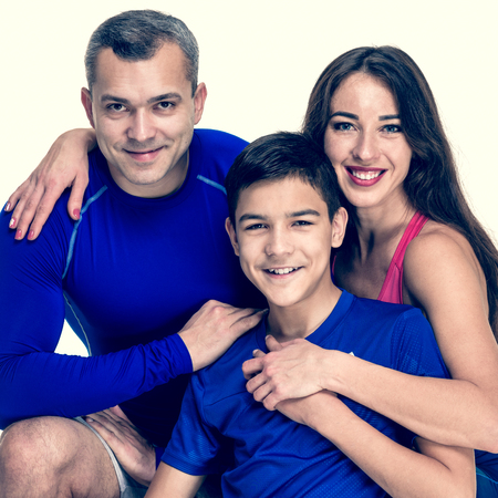 Happy sporty family portrait, image with warm vintage toning
