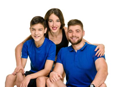 Portrait of active athletic family leading healthy lifestyleの写真素材