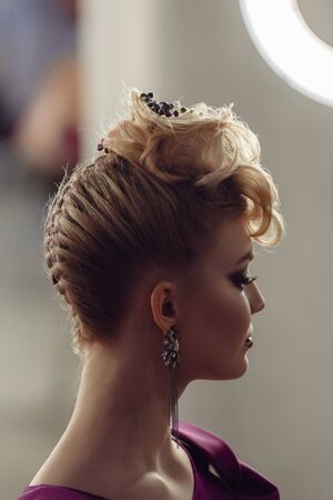 Dnepr, Ukraine- Maj 18, 2019: Female model showing her elegant hairstyle during open hairdressing contestのeditorial素材