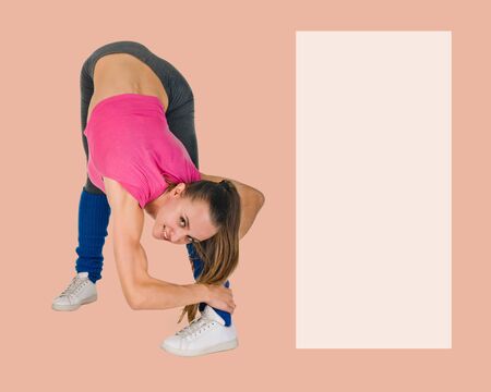 Young woman in sportswear stretching on background with copyspace for text or advertising