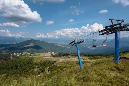 Chair lift with beautiful nature background in Ukrainian Carpathiansの写真素材