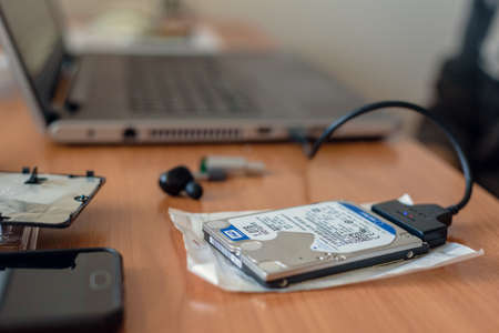 Dnepr, Ukraine- May 04, 2020: Data transfer process from laptop to external hard diskのeditorial素材