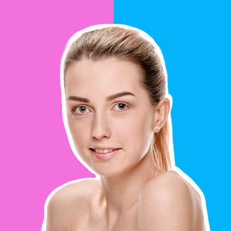 Young natural woman with clean healthy face skin on purple helio and blue background with white...