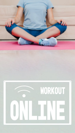 Concentrated attractive woman practicing yoga while stay home for quarantine, online training, virtual trainer, image with text workout online and oriented for use on a smartphone.