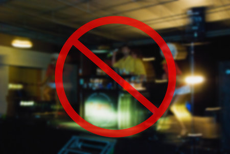 Red forbidden sign informing about cancelled events due to pandemicの写真素材