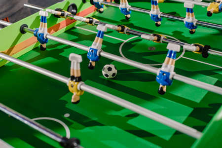 Dnepr, Ukraine- September 06, 2020: Closeup photo of plastic players in table football gameのeditorial素材