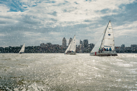 Dnepr, Ukraine- September 09, 2018: summer sport, outdoor socializing, White sailboats floating on blue river water on sunny summer dayのeditorial素材