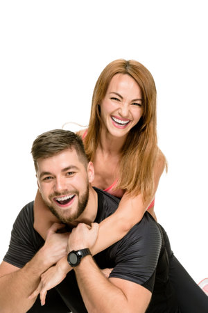 Portrait of cheerful fit sporty couple having funの写真素材