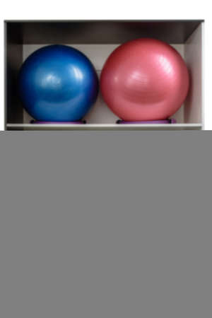 in French inscription sorry we are closed. the closure of the gym during the lockdown. Closeup of shelf with sport inventory in modern fitness centerの写真素材