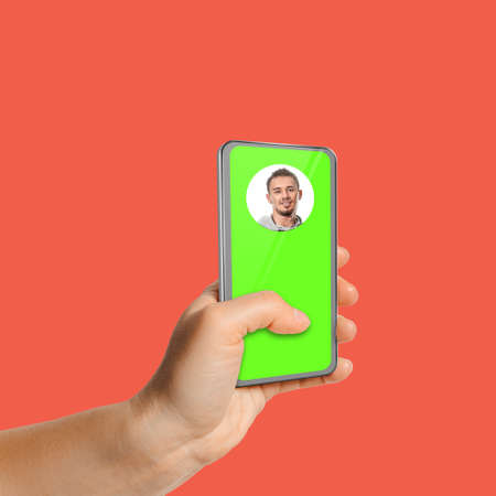 Online assistant from mobile application, male avatar on smartphone screen