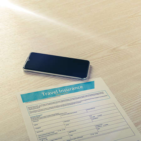 Opportunity to purchase travel insurance policy online on smartphoneの写真素材