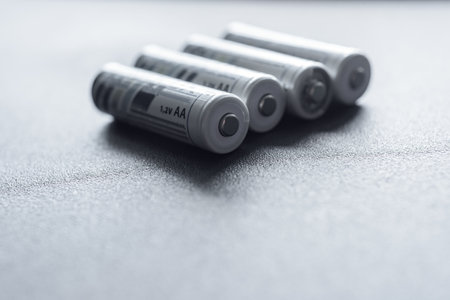 Closeup photo of gray alkaline metal AA size batteriesの写真素材