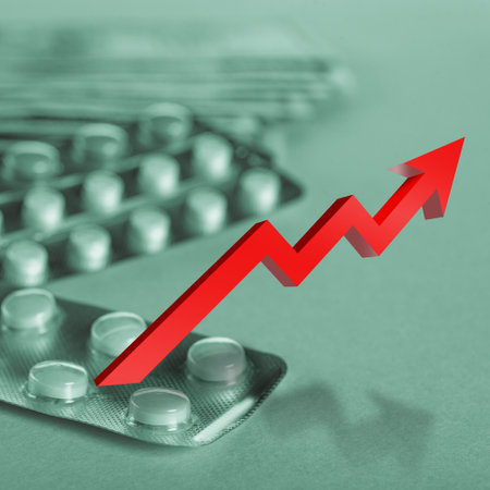 Cash dollar money and various pills in monochrome with green tinting and a red arrow