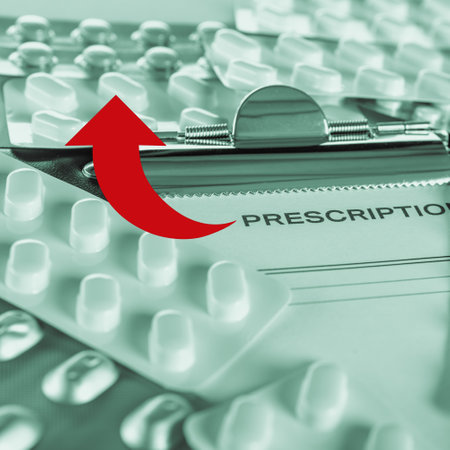 Different pills and prescription with instructions and dosage for disease treatment in monochrome with green tinting and a red arrowの写真素材