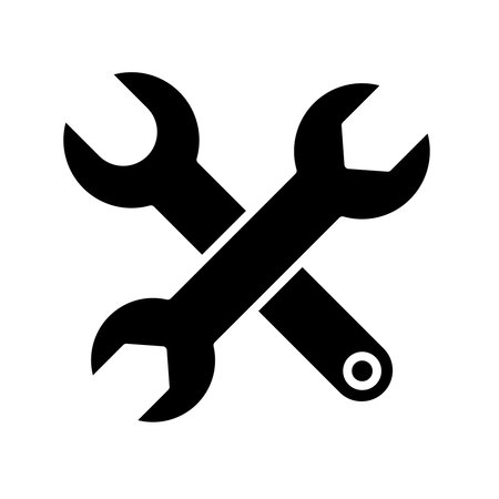 This black and white icon showcases a wrench and tool, symbolizing repair and maintenance activities. Ideal for mechanics and DIY enthusiasts.のイラスト素材