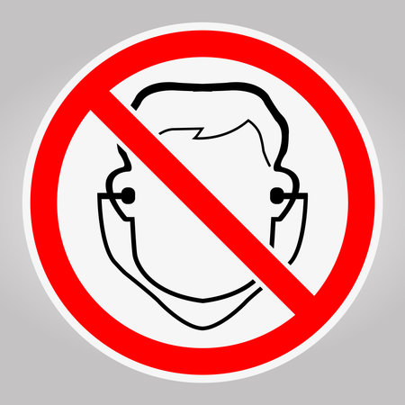 This image depicts a prohibition sign featuring a stylized face within a red circular design. Ideal for conveying messages about restrictions and safety in various environments.のイラスト素材
