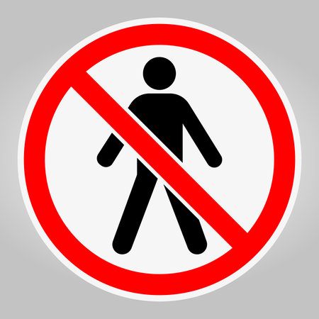 A clear no walking symbol enclosed in a red circle, ideal for conveying safety restrictions in urban areas. Perfect for signage and informational graphics.のイラスト素材