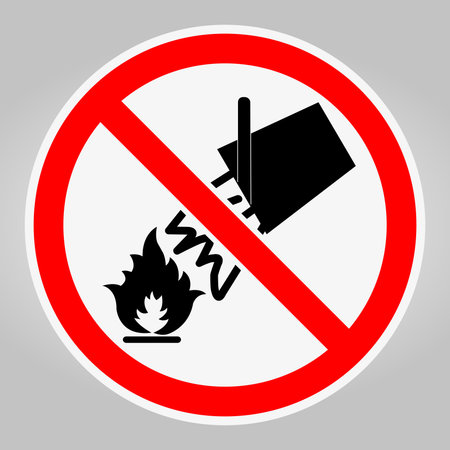 Warning sign featuring a hand and flame icon within a red circle. Emphasizes the importance of fire safety and prevention measures in various environments.のイラスト素材