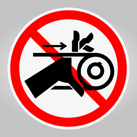 This image features a prohibition sign that warns against using tools near machinery. The design combines bold graphics with a safety message for workplace awareness.のイラスト素材