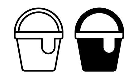 Black and white illustrations of buckets with paint dripping from the rim, perfect for creative projects, DIY themes, and minimalistic design.のイラスト素材