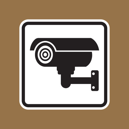 This image features a simple yet impactful surveillance camera icon on a brown background, serving as a clear symbol for security and monitoring purposes in various environments.のイラスト素材