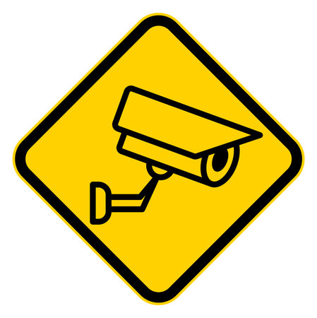 A vibrant yellow caution sign graphic featuring a security camera icon. This imagery represents...