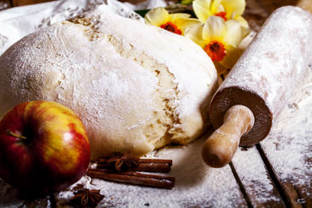 risen yeast dough homemade with appleの写真素材