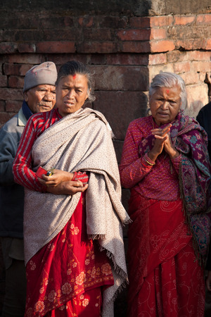 BHAKTAPUR, NEPAL - APRIL 19, 2013:Residents of Bhaktapur watch a ritual dance called Bhairav Dance in Bisket Jatra is  which is held during the celebration of Nepali New Year on the square in Bhaktapur.のeditorial素材