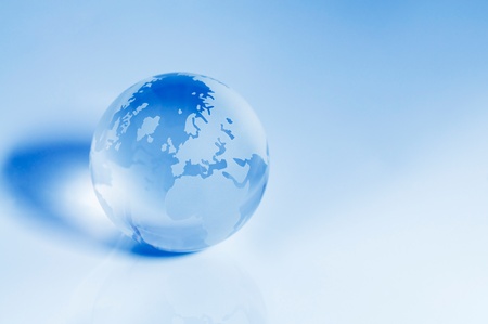Blue crystal globe focusing on the Europe and Africa area.の写真素材