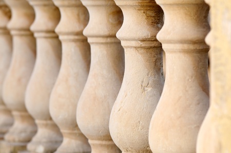 Close up detail with depth of field of balustrade with beige sandstone Columns.の写真素材