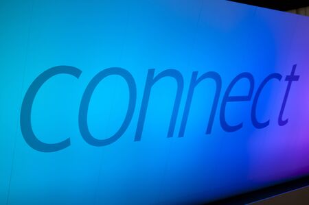 Connect word on blue illuminated wall の写真素材