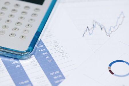 Business concept - Calculator and Charts, toned image.の写真素材