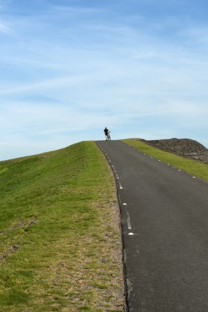 Mountainbiker on mountain bike on Halde Hoheward, Herten, Germanyの写真素材