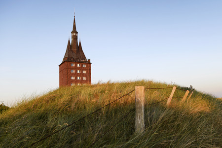 The west tower of the Iceland of Wangerooge at sunset, Germany.のeditorial素材