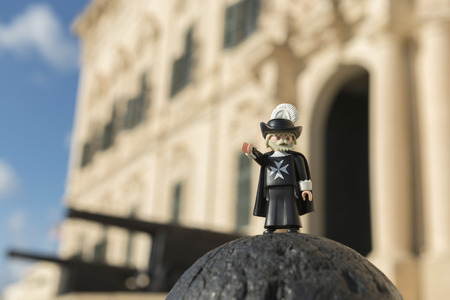 Valletta, Malta - October 11, 2016: Playmobil maltese knight with the Auberge de Castille in the...
