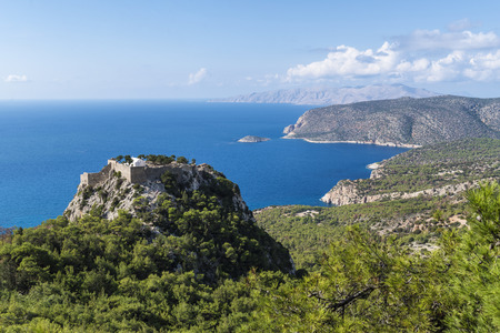 Overlooking the Venetian Castle at Monolithos built in 1480 by the Knights of Saint John, Rhodes, Greece, Europeの写真素材