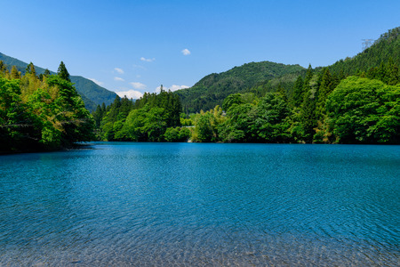 The dam lake of the blue water surfaceの写真素材