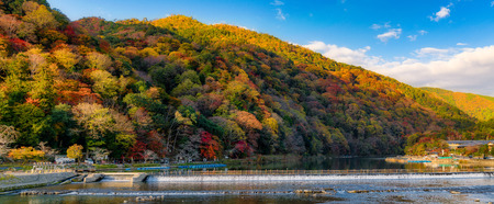 The Togetsukyo Bridge Arashiyama Kyoto Japan in autumnの写真素材
